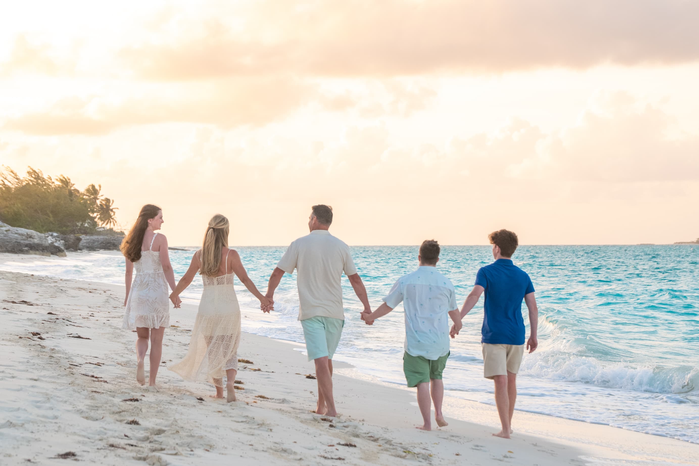 Posing for a family photo on the beach